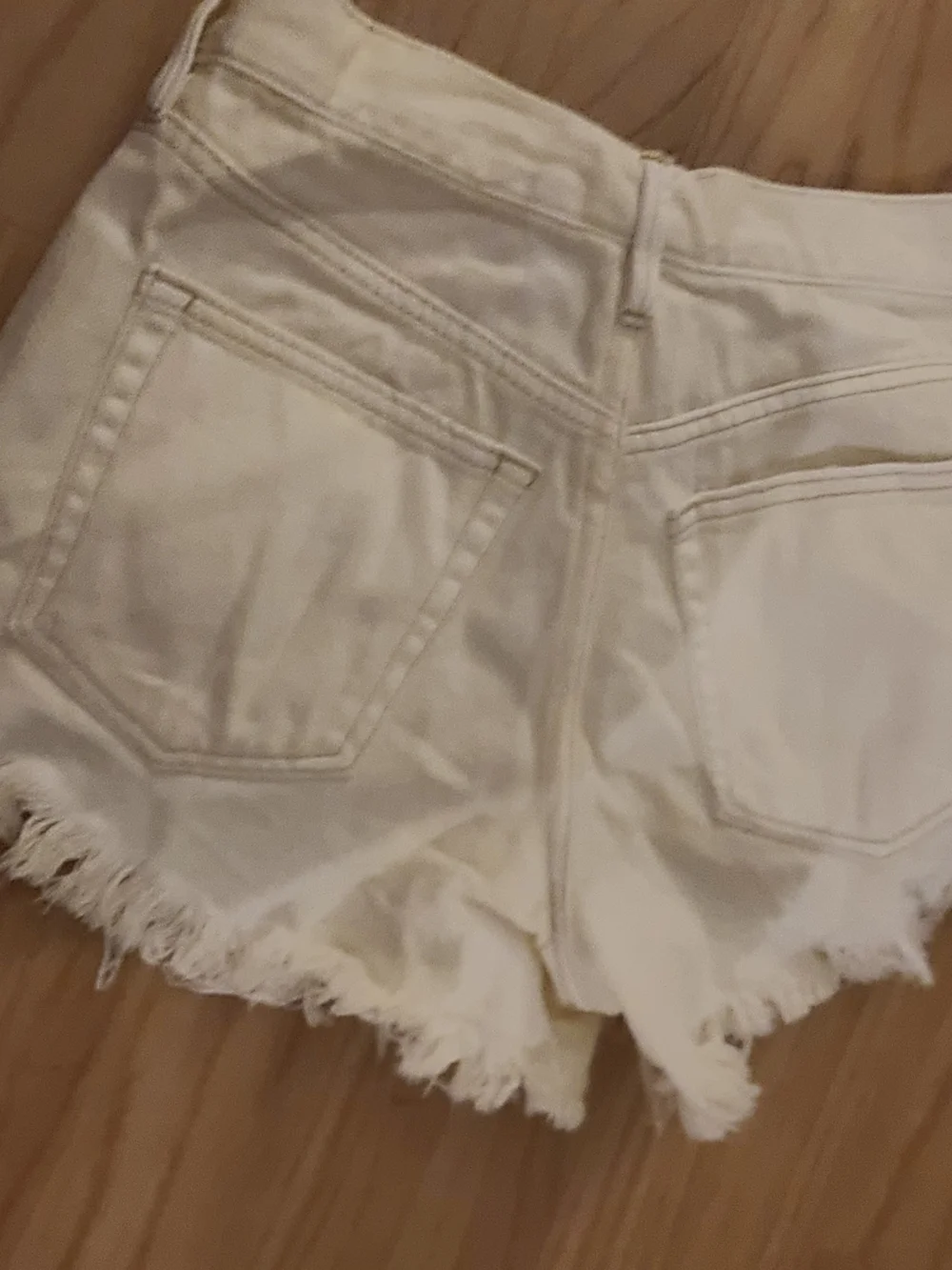 Free People Cream Distressed Denim Cutoff Shorts